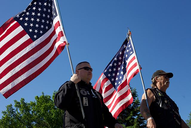 men with american flags