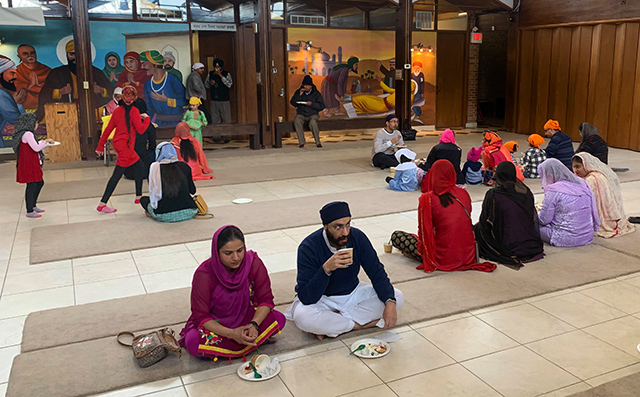 Worshippers at the Sikh Society of Minnesota ate their langar meals