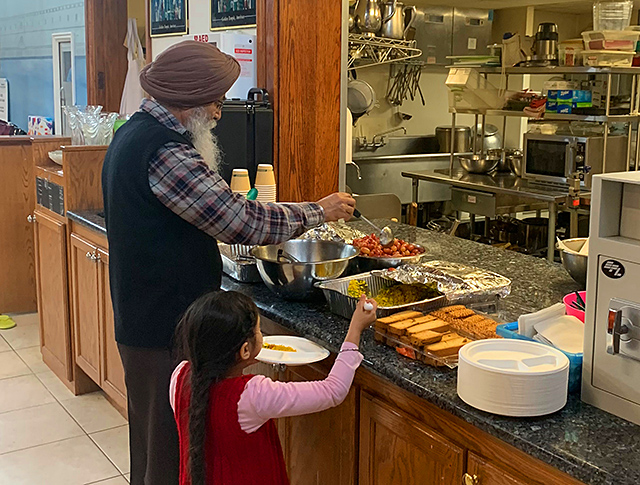 Worshippers at the Sikh Society of Minnesota dished up their langar meals