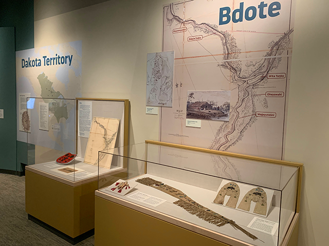 Map and artifact display at the new exhibit “Our Home: Native Minnesota.”