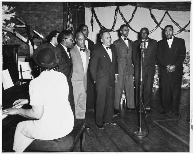 historic photo of singing group