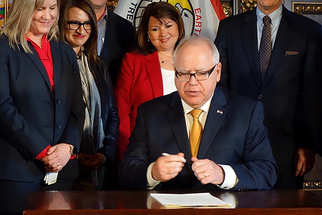 Gov. Tim Walz signed the bill in a ceremony Tuesday.