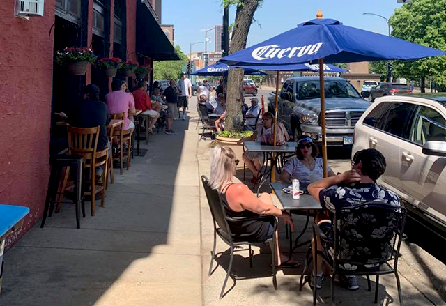 The Grand Seven bar on West 7th Street in downtown St. Paul did brisk outdoor patio business Monday afternoon.