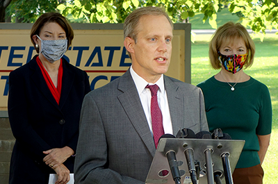 Secretary of State Steve Simon, shown with Sens. Amy Klobuchar and Tina Smith
