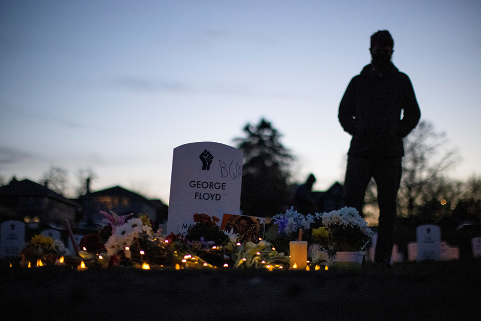 A local resident stands at the "Say Their Names" cemetery on the day of the guilty verdict in the trial of former Minneapolis police officer Derek Chauvin, at George Floyd Square in Minneapolis.