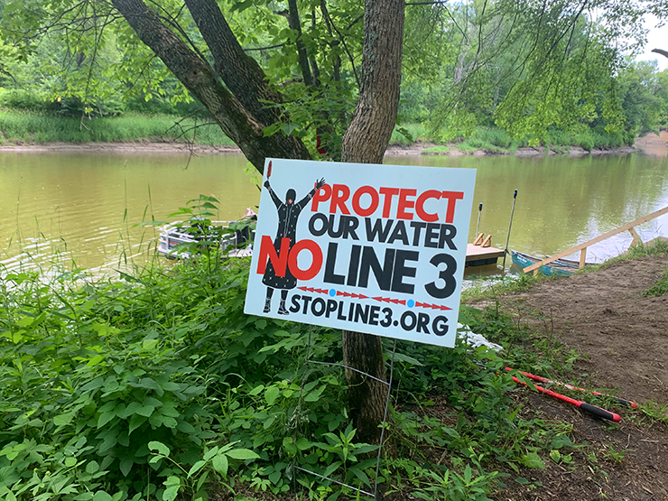 The banks of the Mississippi River and the Great River Road in Aitkin County outside of Palisades are dotted with pro-water and anti-Line 3 and -Enbridge signs.