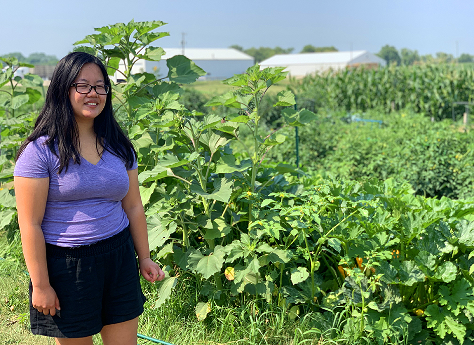 Lily Sugimura, a student at the University of Minnesota-Morris, at the community garden in Pelican Rapids.