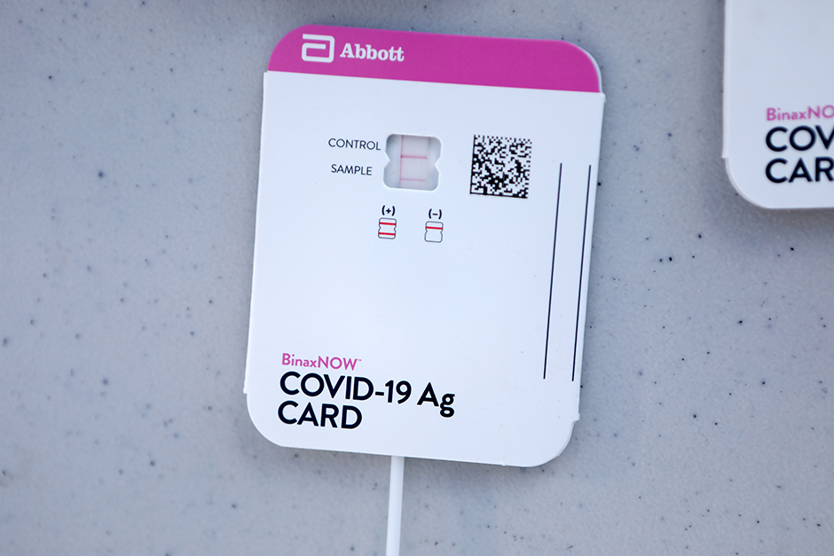 A positive COVID-19 test result seen at a mobile testing site.