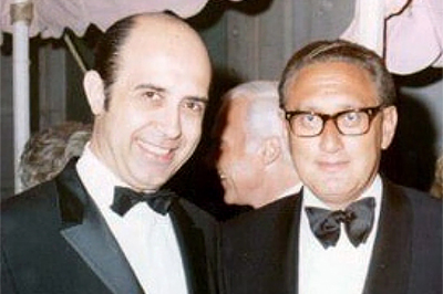 An undated photo of Elias P. Demetracopoulos, left, with Henry Kissinger, secretary of state and national security adviser under Presidents Nixon and Ford.
