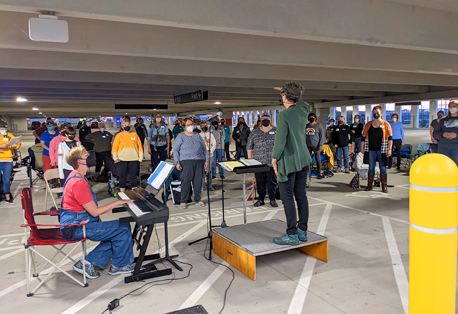 The 200-member Twin Cities Women’s Choir practicing in the HealthPartners parking ramp in Bloomington.