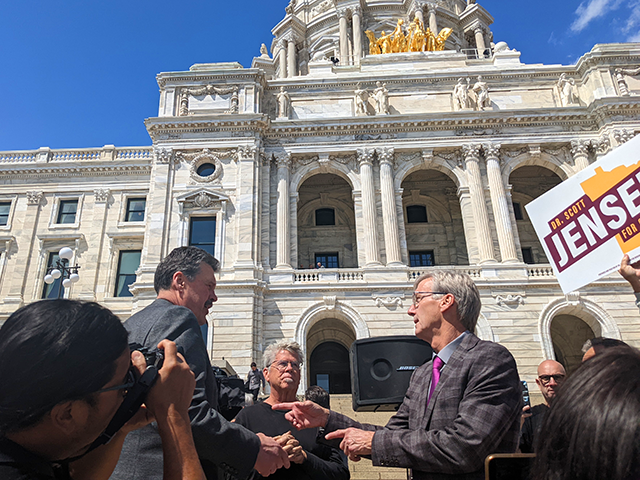 GOP gubernatorial candidate Scott Jensen, right, holding a rally outside the Minnesota State Capitol on May 23.