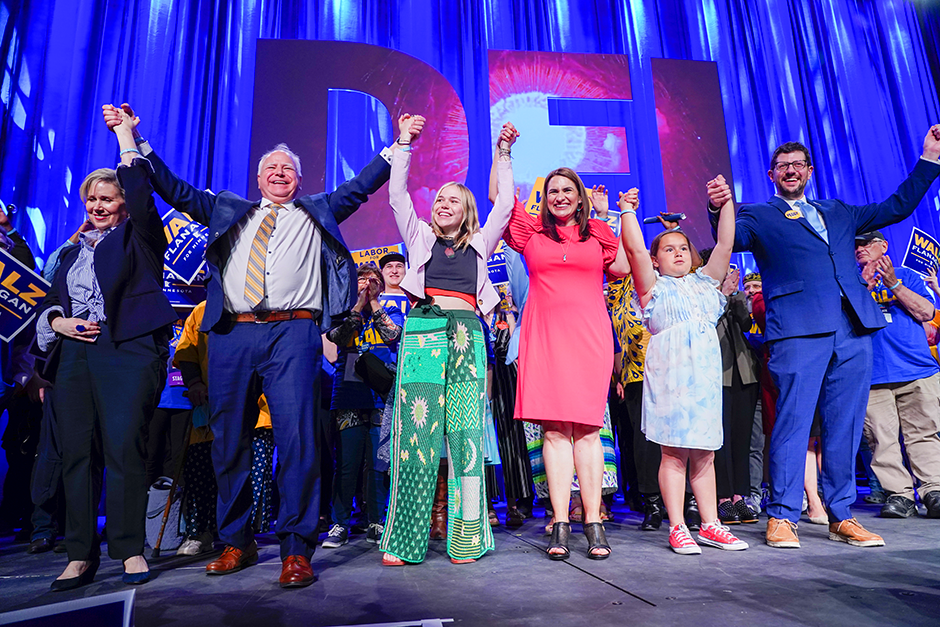 Gov. Tim Walz, Lt. Gov. Peggy Flanagan and their families celebrated after their nominations and speeches during the DFL convention in Rochester on Friday.