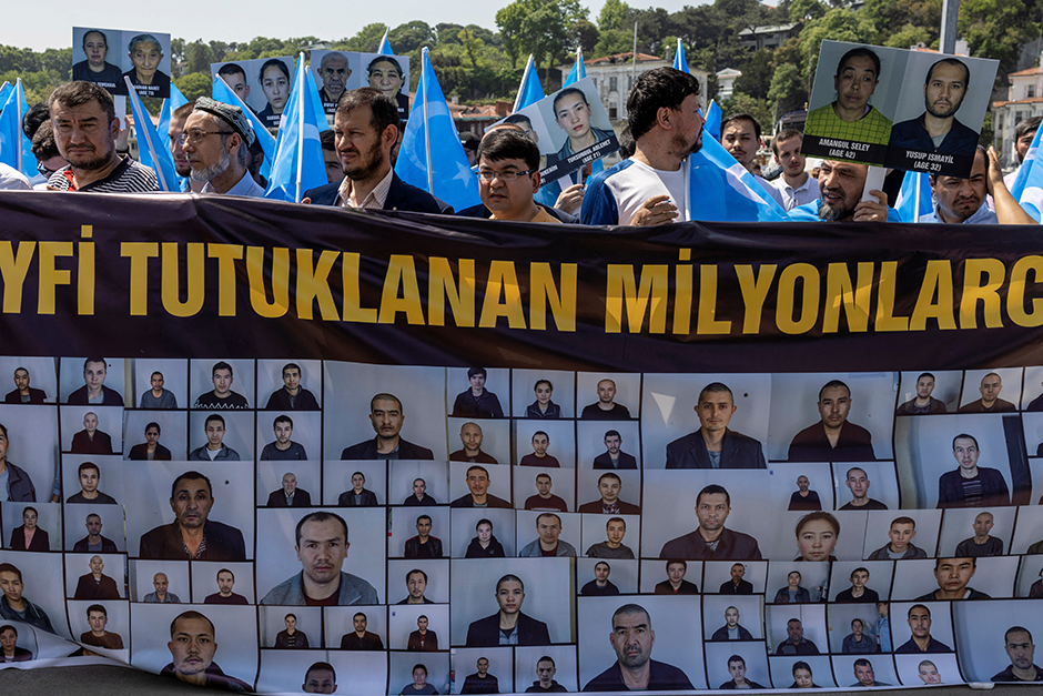 Ethnic Uyghurs displaying banners and holding East Turkestan flags during a protest against China near the Chinese Consulate in Istanbul, Turkey, last month.