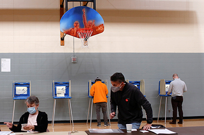 Minneapolis residents shown casting ballots at Rev. Dr. Martin Luther King Jr. Park.