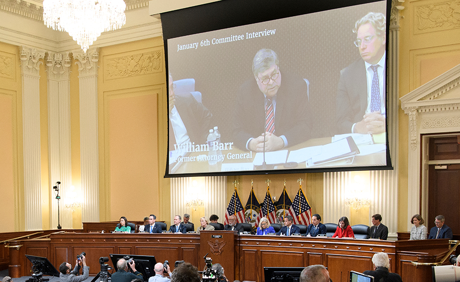 A video image of then attorney general William Barr is seen on a screen as the House select committee investigating the Jan. 6 attack on the U.S. Capitol holds public hearings to reveal the findings of a year-long investigation.