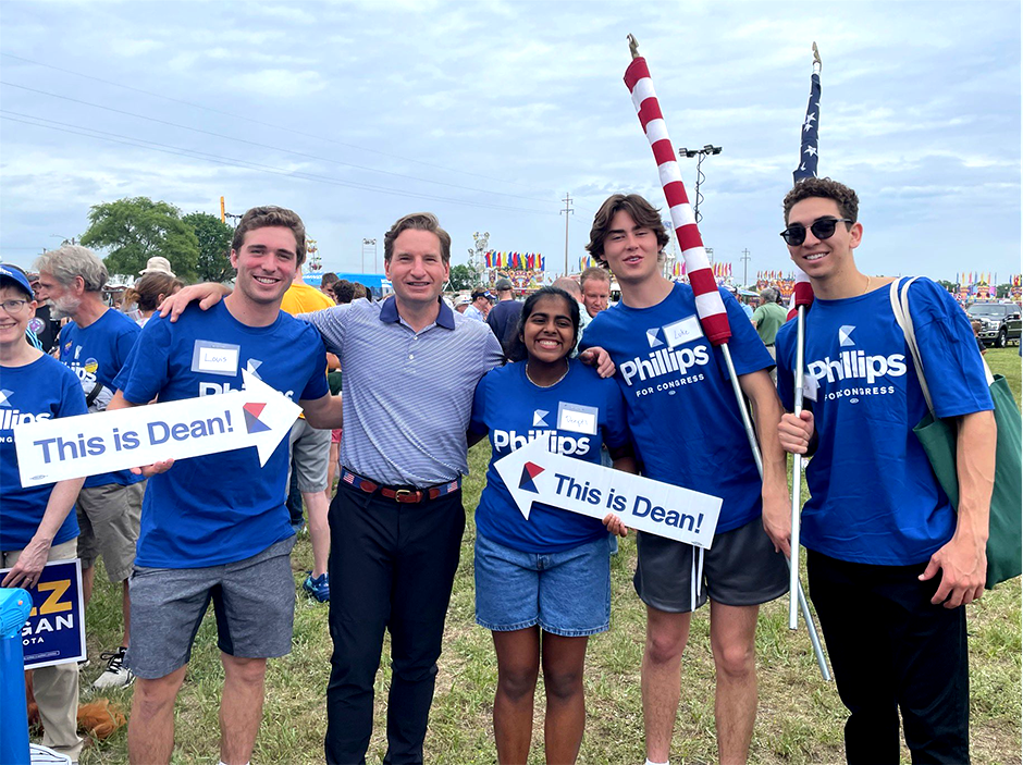 Rep. Dean Phillips and members of his campaign at a July 3 parade in Coon Rapids.