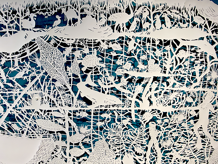 Detail from Lost Searching. Cut paper on painted background.