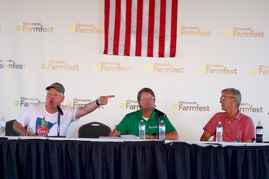 Gov. Tim Walz and Republican candidate Scott Jensen shown during Wednesday's forum at Farmfest. Moderator Blois Olson is in the middle.