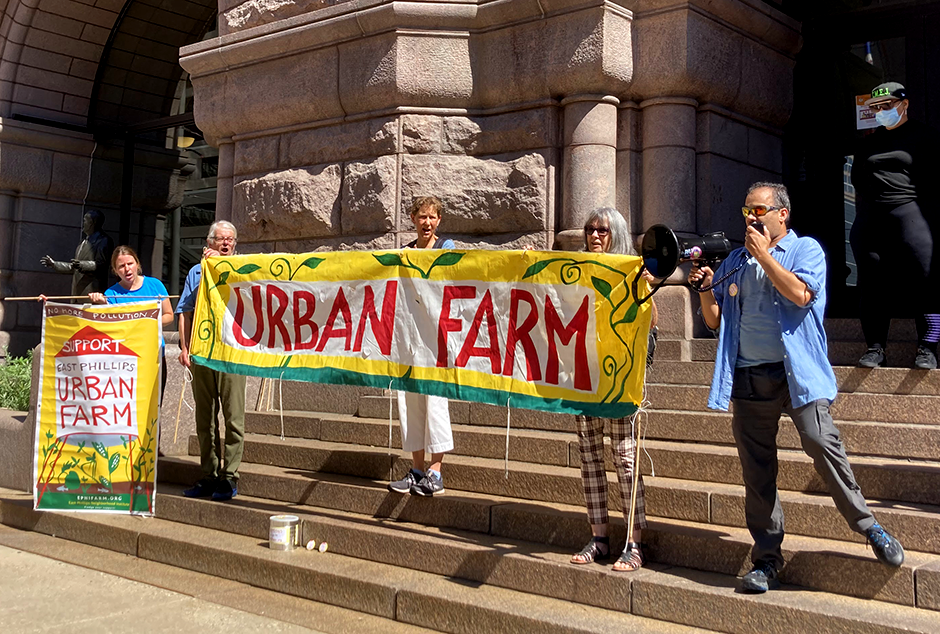 Advocates for the East Phillips Neighborhood Institute's urban farm plan for the Roof Depot site spoke at a press conference outside Minneapolis City Hall last month.
