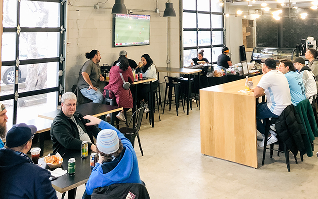 The coffee shop, which serves beer and wine at night, provides a communal gathering place.
