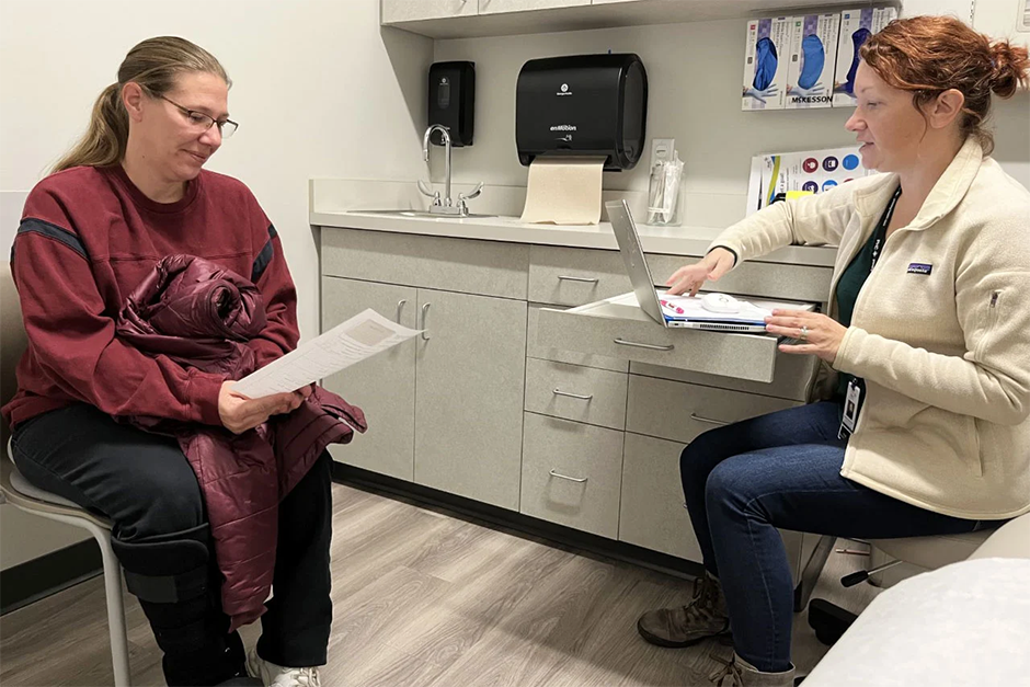 Bonnie Purk, left, meeting with nurse practitioner Andrea Storjohann at the Primary Health Care clinic in Marshalltown, Iowa.