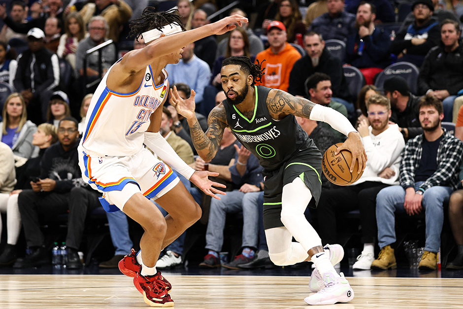 Minnesota Timberwolves guard D'Angelo Russell dribbling the ball against Oklahoma City Thunder forward Ousmane Dieng during the fourth quarter at Target Center on December 3.