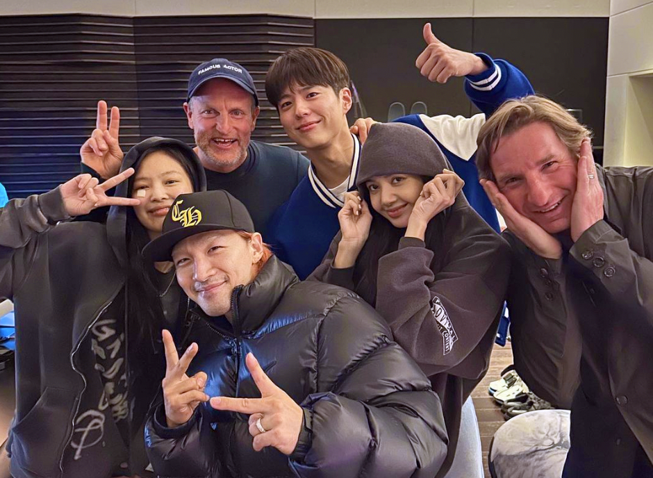 Rep. Dean Phillips, far right, actor Woody Harrelson, in back, with K-Pop stars from BigBang and BLACKPINK and popular South Korean actor, Park Bo-gum, standing next to Harrelson.