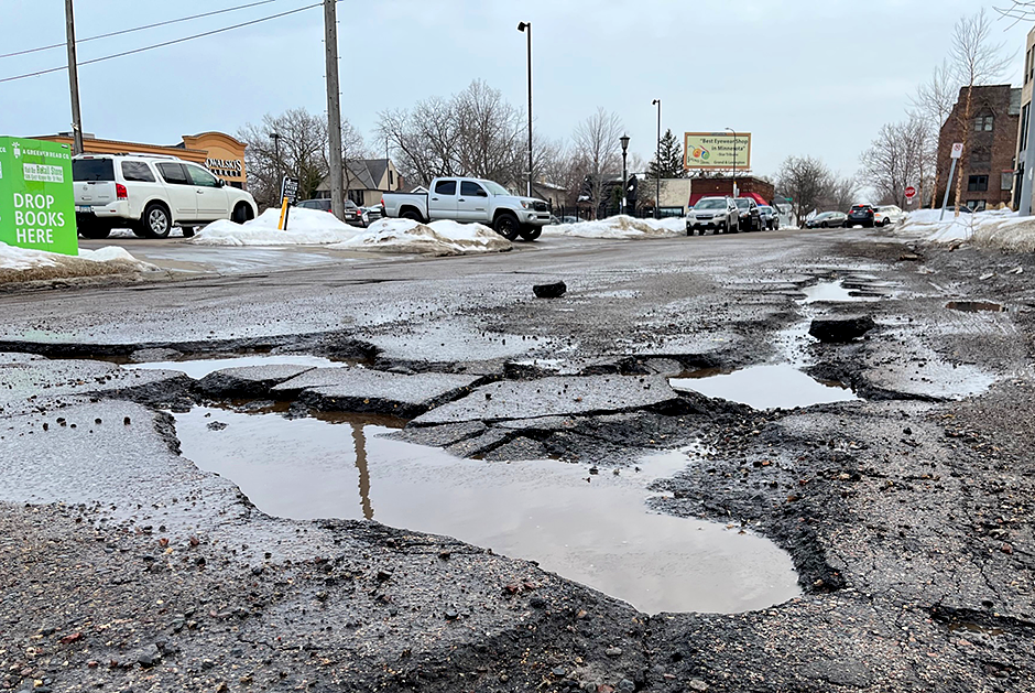 A pothole constellation between Summit and Grand Avenues on Syndicate Street in St. Paul.