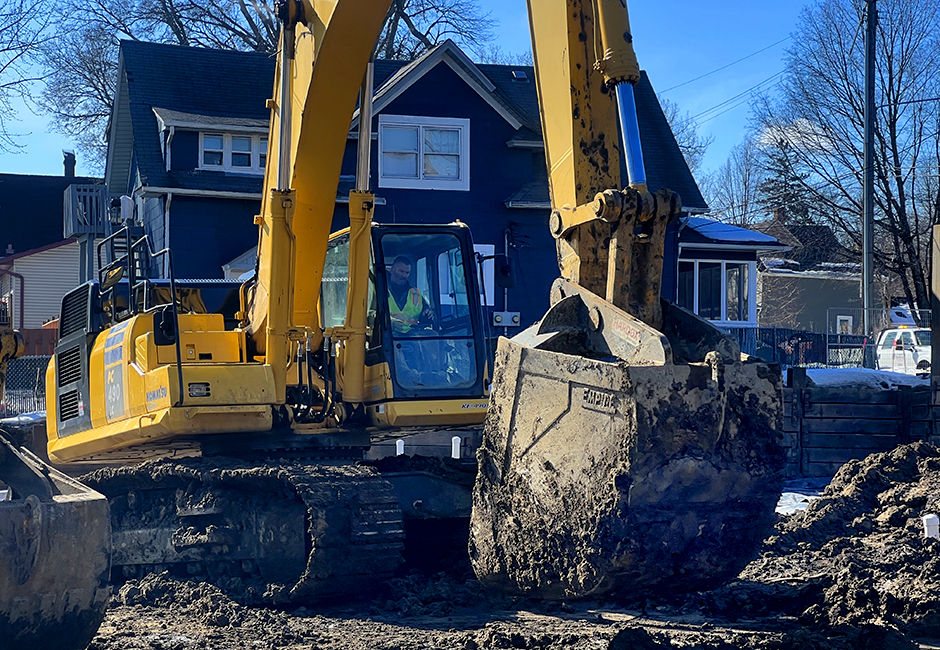 A piece of heavy equipment at work on Feb. 15, in near north Minneapolis at a complex where developers are constructing affordable housing. These units will be townhomes.