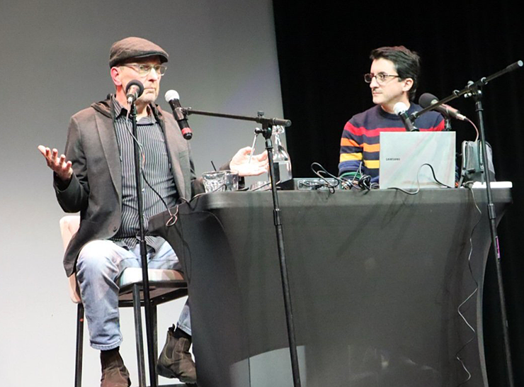 An image from a live event at Lush Lounge and Theater with host J.P. Der Boghossian, right, and guest Bill Burleson.