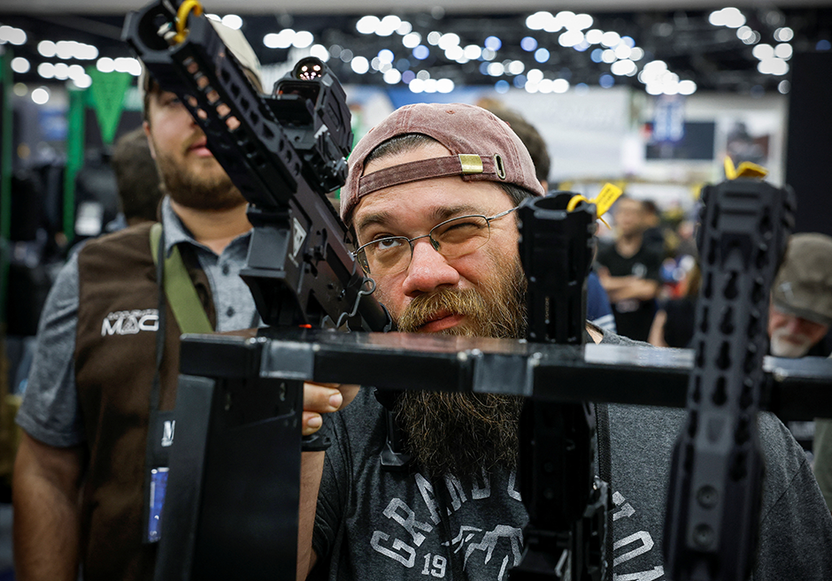 An attendee checking a weapon at the National Rifle Association annual convention in Indianapolis, Indiana, on April 15.