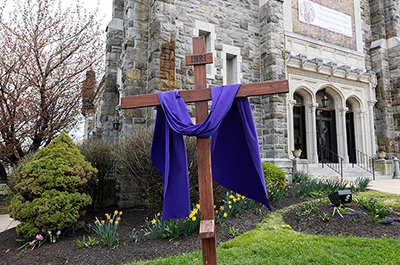 A cross outside St. Michael the Archangel Parish, one of the parishes mentioned in an investigative report by the Maryland Attorney General that detailed sexual abuse accusations against clergy within the Archdiocese of Baltimore dating back to the 1940s.
