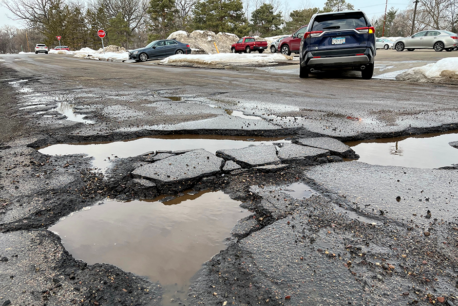 A series of potholes between Summit and Grand Avenues on Syndicate Street in St. Paul.
