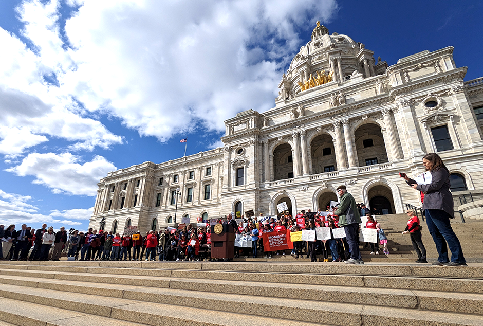 Gov. Tim Walz speaking at a rally on the Capitol steps on Tuesday calling for more gun restrictions in Minnesota.