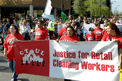 Members of the Centro de Trabajadores Unidos en la Lucha labor organization shown marching in south Minneapolis on International Workers Day in 2012.
