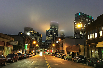 Foggy Minneapolis skyline at dusk
