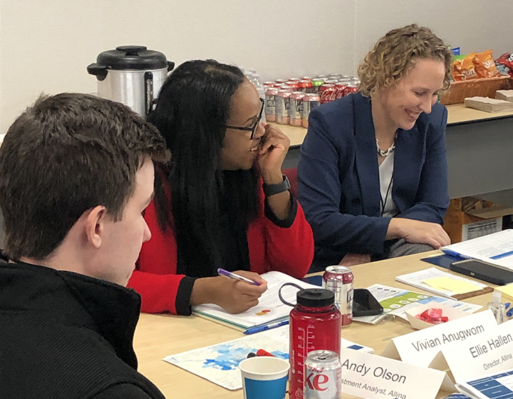 Allina Health’s Andy Olson, Vivian Anugwom and Alison Pence shown attending the first Housing & Health Equity Fellows work session on March 29.