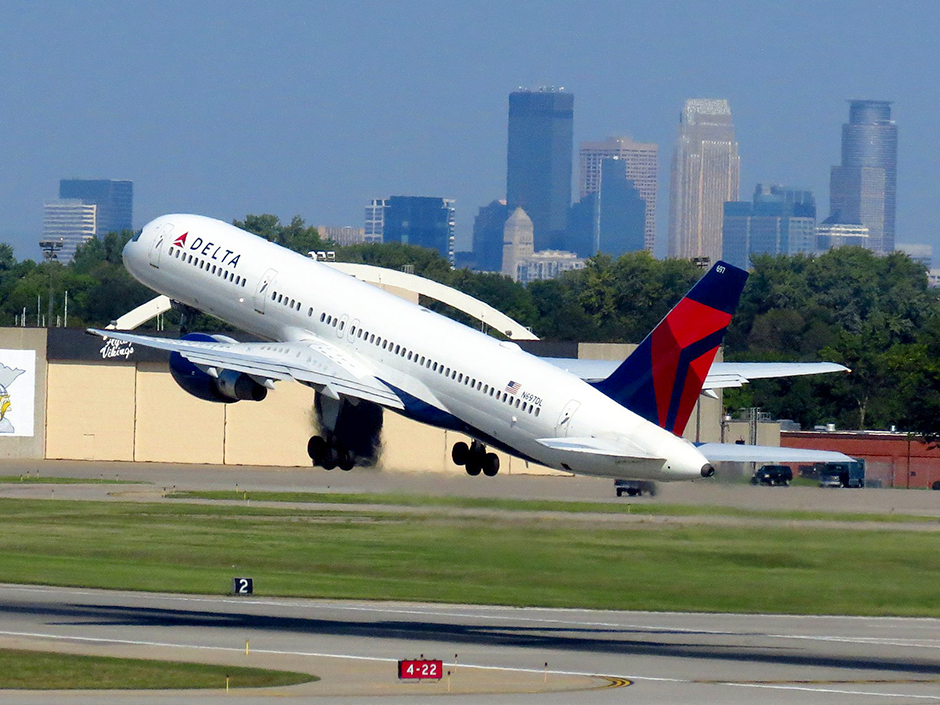 A Delta Air Line passenger plane shown taking off from Minneapolis-St. Paul International Airport.