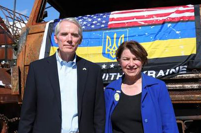 Sen. Amy Klobuchar and former Sen. Rob Portman visited Bucha and Irpin, Ukrainian towns whose residents say they have suffered Russian atrocities and the Hostomel Airport, where Ukrainian forces claimed an early victory against the Russians.