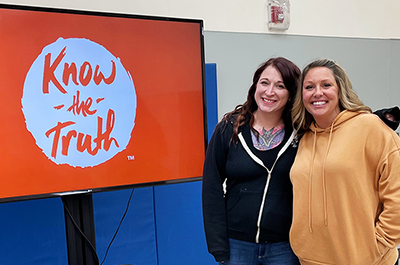 Talia Brodhead,right, community engagement coordinator for MnPRA and program coordinator for BLADE, and Rosie Jensen, a volunteer in recovery who shared her story with students at Brainerd Learning Center on October 16