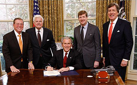 Sen. Pete Domenici, Sen. Ted Kennedy, President Bush, Rep. Patrick Kennedy, Rep. Jim Ramstad at the bill signing.