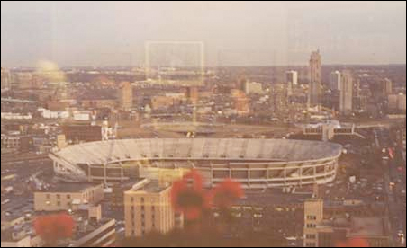 A 1980 aerial view of the construction of the Metrodome looking down Sixth Street South toward the Cedar Riverside area.