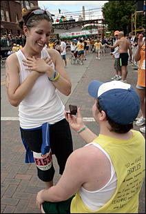 Kyle DeWitt, 24, of Grand Forks, N.D., proposed marriage to Amy Gulka, 24, also from Grand Forks, just after Amy had crossed the finish line.