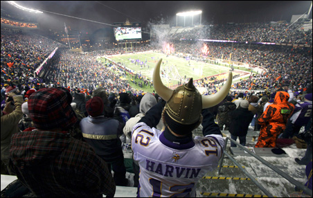 Fans cheers as the Vikings take to the field before the start of their game against the Chicago Bears