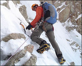 Dean Einerson climbs the steep rock of Cassin Ridge on Mount McKinley.