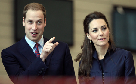 Britain's Prince William and his fiancee Kate Middleton