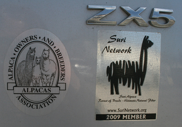 Stickers on a vehicle parked outside Four Seasons Centre.